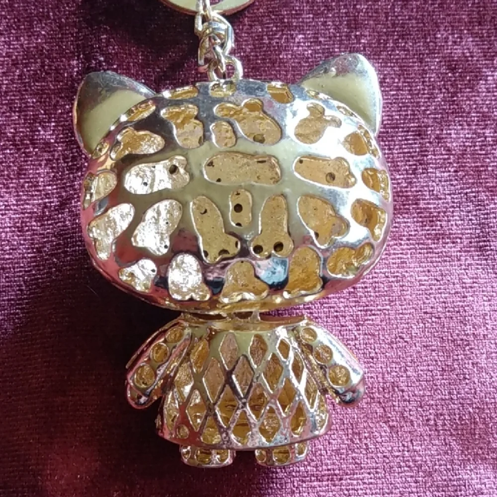 Sparkling Cat Keychain with Gold and Silver Accents